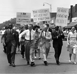 The governor (shirt sleeves) walking in the first rank of an NAACP march, 600-strong, in protest of housing discrimination, June 1963