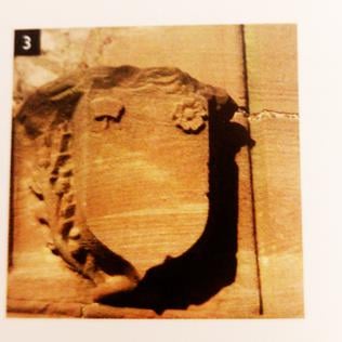 Mel & Rose symbols in stonework at Abbey