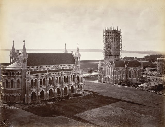 Gothic revival campus of the University of Mumbai, India, showing the Rajabai Clock Tower still under construction in 1878