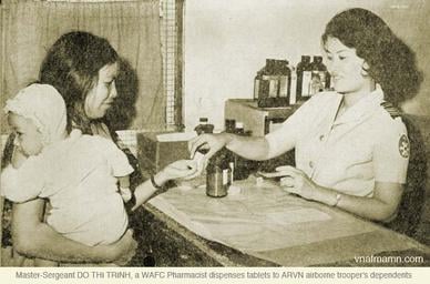 Master-Sergeant and pharmacist Do Thi Trinh, part of the WAFC, supplying medication to ARVN dependents