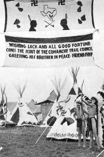 Comanche Trail Council Indian Camp at the National Scout jamboree in Washington, D.C., July 1937. The counterclockwise swastika emblems used for decoration still hold ancient meanings of luck and well-being, and not to be confused with clockwise Nazis symbolism.