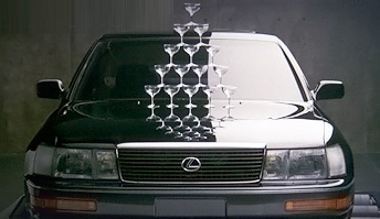 Lexus television debut with champagne glasses stacked on the hood of a revving LS 400