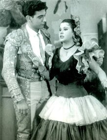 Seventeen-year-old Plácido Domingo as the tenor Rafael the bullfighter in El gato montés with Rosa Maria Montes (Mexico City, 1958)