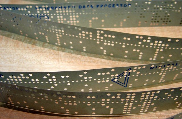 In the 1950s, computer programs were stored on perforated paper tape