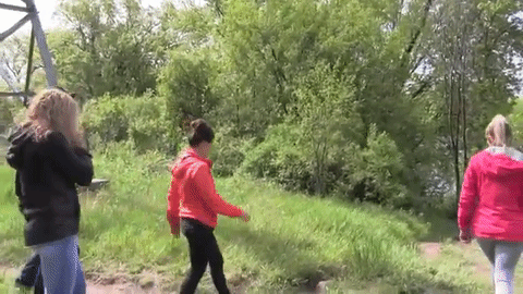 Volunteers and family searching for Aaliyah at Riverside Park in St. Cloud, Minnesota