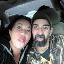 Photo of Alan Murphy in camo with his girlfriend Hau Merck