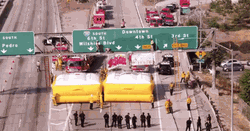 GIF from the music video that was shot while Dephree performed antics on top of a freeway sign*