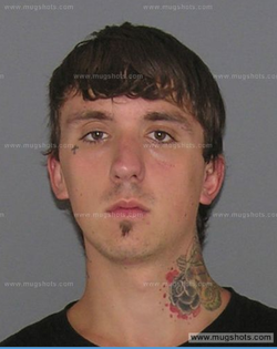 Mugshot of Austin Boutain when he was a younger man.