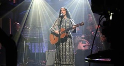 Photo of Bedouine performing live.