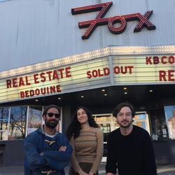 Bedouine with members of the band, Real Estate.