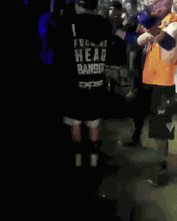 Bass Capital Ninja Headbanging before a mosh pit