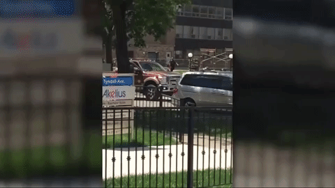Gif of the moment when Merrill drives big pick truck and nearly runs over a protester.