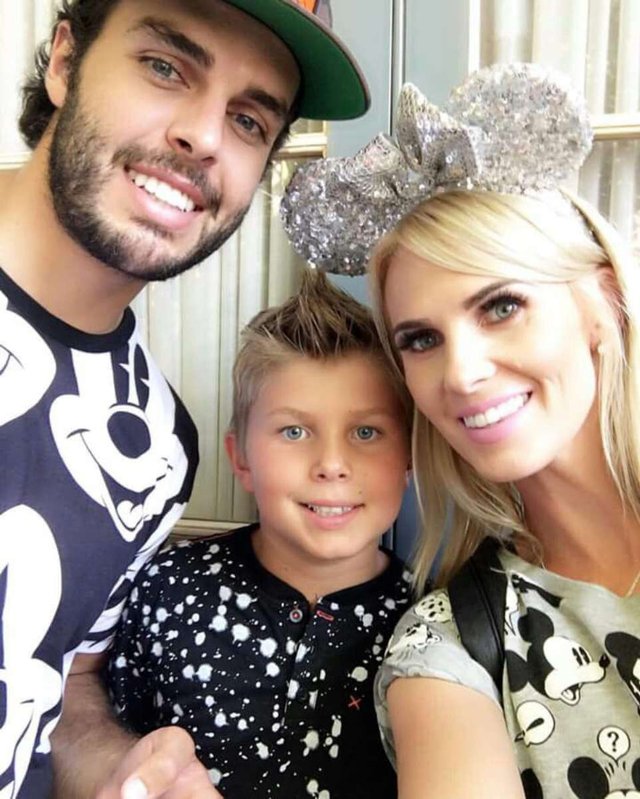 Carli with her husband and son