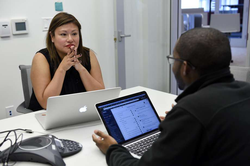 Carolina Huaranca meets with Brian Dixon at the Kapor Center for Social Impact in Oakland.