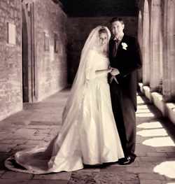 Colbie Paulson with Rob Porter from their marriage. A Gray portrait of the couple resembling a past without color.
