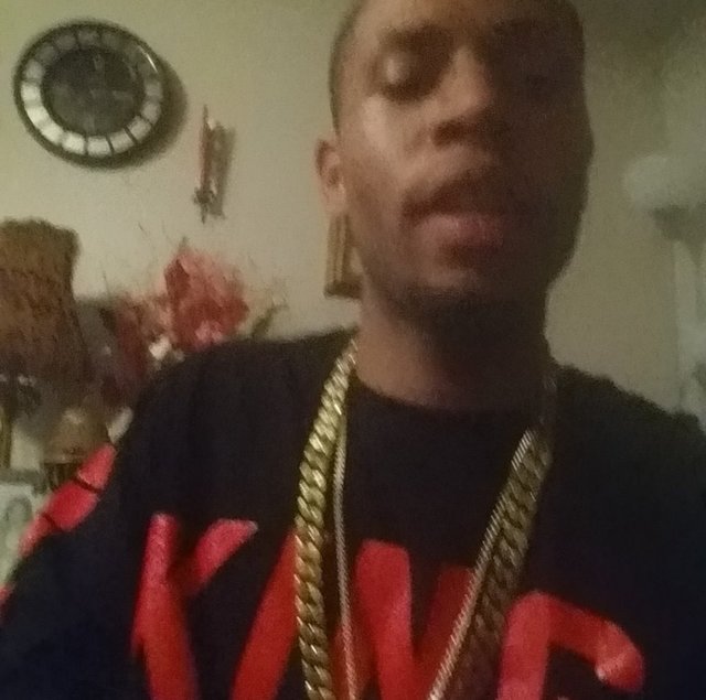 Wearing a gold chain