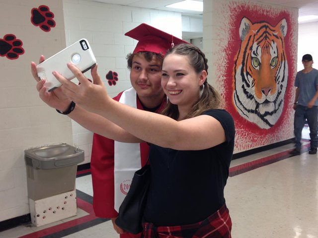 Dalton taking a selfie with his sister