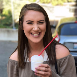 Photo of Danni Messina Smiling.