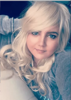 Photo of Danni Tamburo with blonde hair.