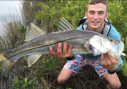 Photo of David Kirk with the fish he caught.