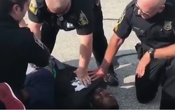 Desmond Marrow unconscious on the ground after his arrest