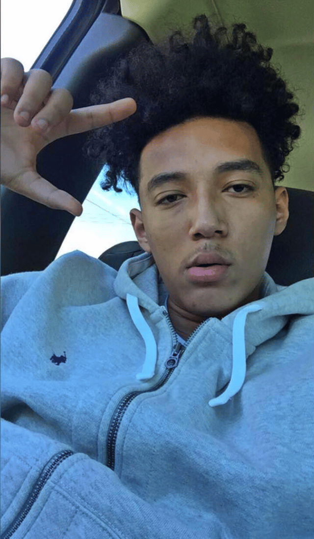 Selfie of Devin inside a car.