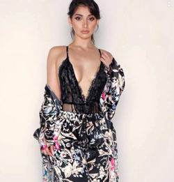 Photo of Deyana Mounira wearing a dress.