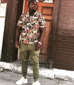 Photo of General Reezy posing for a photo.