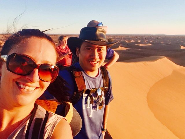 Photo of Geoff with friends in the Sahara Desert on a trip to raise money for a friend's charity