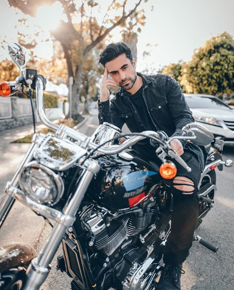 Sitting on a motorcycle