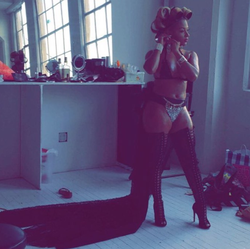 Photo of Gizelle Marie modeling an outfit.