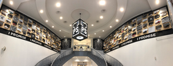 Photo taken inside of the lobby of the I Promise School. The 114 Game worn shoes by LeBron James can be seen along the walls.