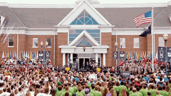 GIF of the I Promise School inauguration day ceremony outside of the school.