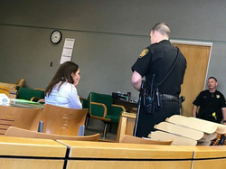 Jacqueline Herron reacts after being sentenced to 11 years and eight months in prison