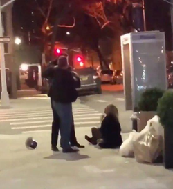 Jacqueline Kent Cooke sits on the ground while her boyfriend intervenes in a scuffle with Matthew Haberkorn during the assault