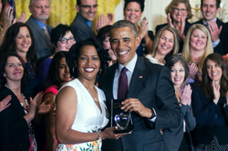 Jahna Hayes being honored by Barack Obama after being named National Teacher of the Year in 2016.