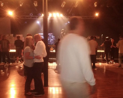 Photo taken of James Ortiz with Molly Berkeley while inside of the Birchmere bar.