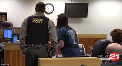 January Neatherlin being taken to jail after her sentencing on Friday, March 9, 2018