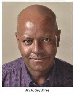 The headshot of Jay Aubrey Jones.