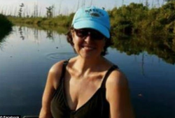 Photo of Jeanette LeBlanc taken near a river.