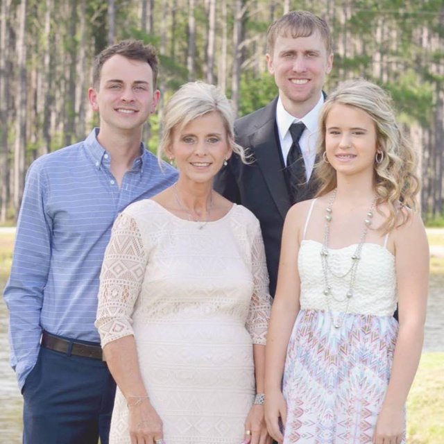 Photo of Jeanette with her three children Makiddian, Chad, and Michael