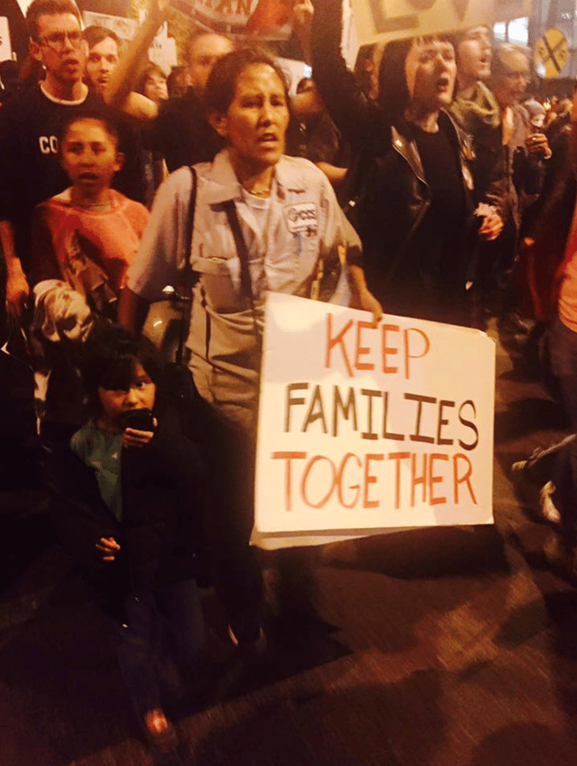 Photo of Jeanette at a rally with one her children.