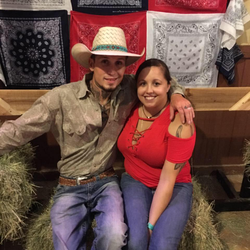 Photo of Johnnie and his girlfriend Summer Caddel inside a barn.