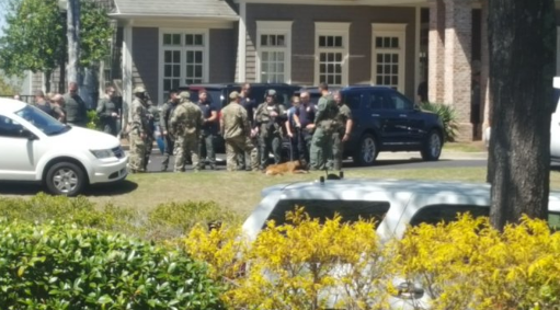 SWAT Team outside where Cassie and Johnny were hiding