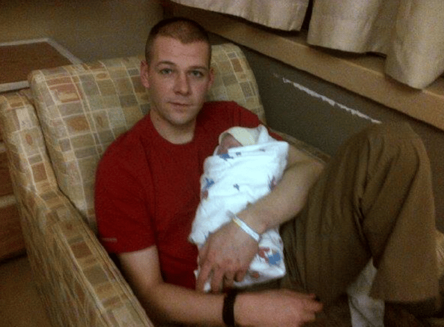 Photo of Walters with is toddler son.