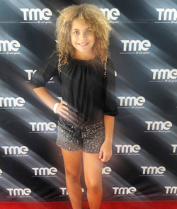 Photo of Kaitlyn Kaylee Brown at a gala event.
