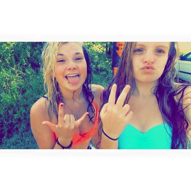 Kassie taking a selfie with a friend
