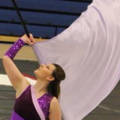 Kayla participating in Color Guard