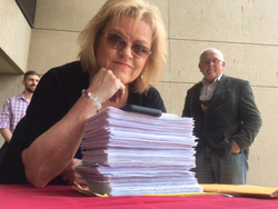 Photo of Kelly Canon at a booth during a rally of Conservative republicans against the Ban of smoking in public areas.