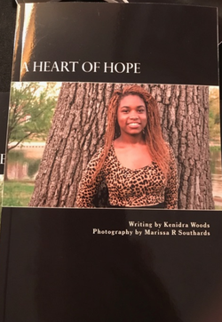 The front cover of the memoir written by Kenidra Woods called, A Heart of Hope.